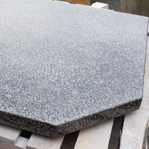polished concrete fire hearth with black chip
