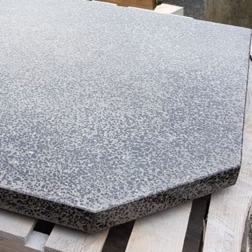 polished concrete fire hearth with black chip