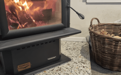 Custom Polished Concrete Hearth with Riverton Beach Stones